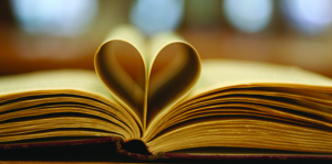 Book pages folded to form a heart